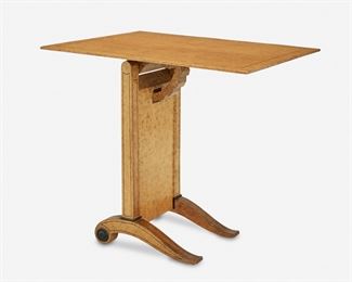 224
An Art Deco Flip-Top Artist's Table
Second-quarter 20th Century
With Biedermeier styling, the faux burlwood veneered artist's table with a cantilevered rectangular top over a flat column raised on two curving scrolled feet
29" H x 24" W x 31" D
Estimate: $800 - $1,200
