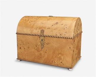 225
A Continental Burlwood Casket
Second-half 20th Century
The burlwood casket with domed lid centering a gilt-metal crown medallion, rope-style carved wood trim, and Greco-Roman-style hammered gilt-metal figural lockplate raised on four white bun feet
12.5" H x 16" W x 10.5" D
Estimate: $500 - $700