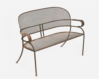 228
An Art Deco Iron And Wire Mesh Garden Bench
Second-quarter 20th Century
The garden bench with wire mesh back and seat enclosed in an iron framework with rounded arms raised on four circular feet
32.75" H x 44.25" W x 20" D
Estimate: $500 - $700