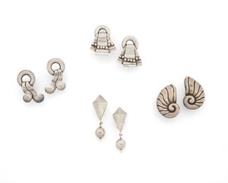 243
A Group William Spratling Silver Earrings
1940-1946 and 1964-1967, First and Third Design Period; Taxco, Mexico
All Stamped for William Spratling; Two stamped: Silver; One stamped: Taxco Mexico / 925
Including four pair of silver screw-back earrings, 8 pieces
Largest earrings: 1.25" H x 1" W
51.0 grams
Estimate: $500 - $700