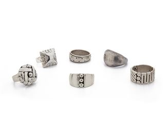 244
A Group Of William Spratling Silver Rings
1933-1939, 1940-1946, and 1949-1952, First and Third Design Periods; Taxco, Mexico
All stamped for William Spratling; One stamped: Taxco / 980; One stamped: 980; One stamped: 925
Including six silver rings; 6 pieces
Ring sizes: 12.50, 10.50, 11, 10, 7.50, 7.50
71.5 grams
Estimate: $500 - $700