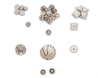 247
A Group Of William Spratling Silver Buttons
1933-1939, 1940-1944, and 1956-1962, First and Third Design Period; Taxco, Mexico
Each stamped for William Spratling; Others variously stamped: Made in Mexico / Silver / Sterling / Taxco / 980 / Eagle 63
Comprising three sets of matching silver buttons and miscellaneous buttons, 28 pieces
Largest: 1.5" Dia.; Smallest: .5" Dia.
129.5 grams
Estimate: $500 - $700