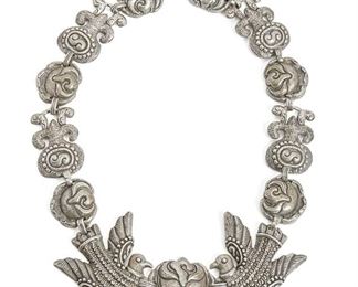 264
A Matl Silver Necklace
1935-1948; Mexico City, Mexico
Signed: Matl
Designed by Matilde Poulat, the silver necklace in a birds and roses motif
19" L x 1.875" H
184.5 grams
Estimate: $3,000 - $5,000
