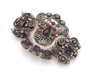 265
A Matl Silver Gem-Set Bracelet
1934-1948; Taxco, Mexico
Stamped: Matl
Designed by Matilde Poulat, set with amethyst, turquoise, and coral
6.625" C x 2.5" H
97.0 grams
Estimate: $800 - $1,200