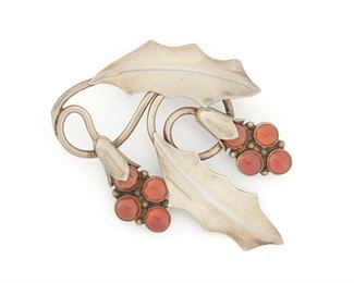 268
A Fred Davis Vermeil And Orange Glass Floral Brooch
Pre-1948; Mexico City, Mexico
Stamped: FD [Fred Davis]; Further stamped: Silver / Mexico
A silver vermeil stylized flower brooch set with eight round cabochon fire opals
3" L x 2.25" H
25.5 grams
Estimate: $400 - $600
