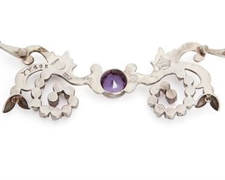 285
Two Antonio Pineda Silver And Amethyst Necklaces
1953-1979; Taxco, Mexico
Crown mark for Antonio Pineda; Further stamped: Eagle 17 / Silver / Made in Mexico / YY482 / 970
Comprising a necklace with faceted and cabochon amethyst in a scrolled setting (18" L x 1.75" H) and an abstract necklace with a single cultured pearl (16.75" L x 2.25" H x 1" W), 2 pieces
135.0 grams
Estimate: $700 - $900