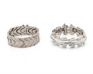 295
Two Antonio Pineda Silver Bracelets
1953-1979; Taxco, Mexico
Crown mark for Antonio Pineda; One stamped: Eagle 17; One stamped: Eagle 207; Each variously stamped: Hecho en Mexico / 970 / ZZ616 / Sterling / JVL Taxco
Comprising a stylized leaf-motif bracelet and an interlocking link bracelet, 2 pieces
Largest bracelet: 6.75" L x 0.75"H
238.0 grams
Estimate: $1,200 - $1,800