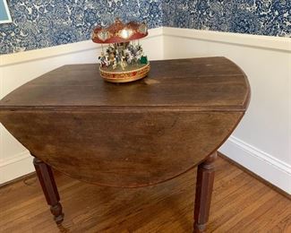 Antique Solid Wood Drop Leaf Table on Casters