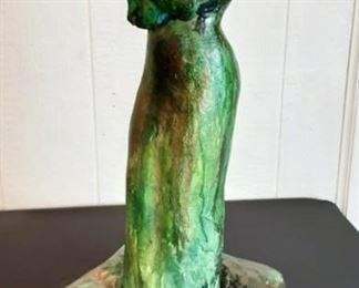 Lot #1  - Estimated Value $450
Alixandra Summitt "Woman & Child" Clay Sculpture
Description:	
Green With Brass Highlights H 25" Donor: Alixandra Summitt