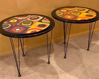 These fun contemporary tables have colorful circles and designed with a shiny coating/finish that makes these tables even more beautiful! Add a splash of color to your decor with these awesome tables. 

They measure 23.5 inches in diameter and are 22 inches tall.