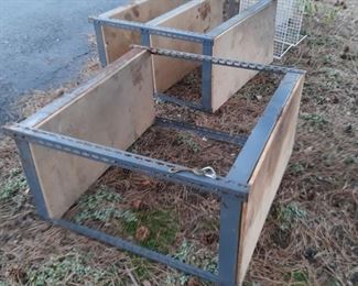 Three of these metal shelf units are available 