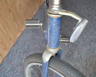 vintage Schwinn bike with banana seat and racing slick rear tire