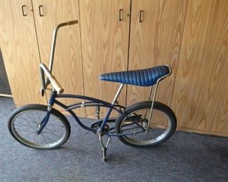 vintage Schwinn bike with banana seat and racing slick rear tire
