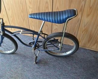 vintage Schwinn bike with banana seat and racing slick rear tire
