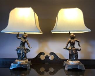 Dining Room: A pair of “bronze-look” 1947 ALBA ART spelter Thai dancer lamps with round marble bases are a great conversation piece.
