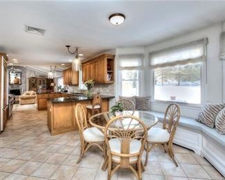 Rattan Dining Table and 4 Upholstered Chairs