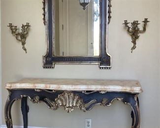 CONSOLE (1of3) Italian Rococo Black with Gilt Trim. Top is laminated wood and has marble look. Pictures show entire set being offered in lots 4, 4b, and 4c. This lot is for the console table only.
Console measures 54 1/2 in wide x 21 in deep x 33 in height