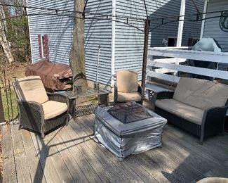 Patio furniture: 2 chairs, loveseat and coffee table. Grill not available.