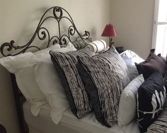 Queen-size metal beds and lots of decorative pillows!