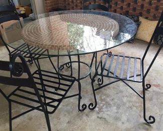 Four-piece wrought iron set.