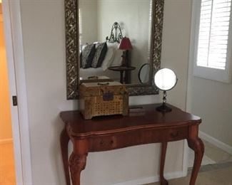Large mirror and side table.
