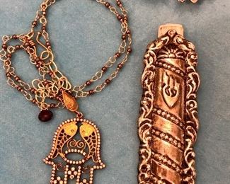 Item 212:  Hamsa Necklace: $12                                                                     Item 213:  Sterling Silver Mezuzah Pendant: $38                                Item 214:  Sterling Silver Salamander Pin: $26