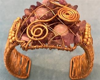 Item 215:  Gold tone Wire Bangle with Lavender Color Stones:  $20