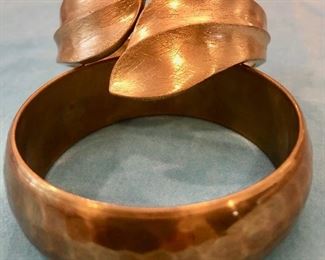 Item 216:  Pair of Gold Tone Bangles: $14