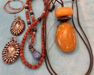 Item 220:  Large Yellow Resin Drop on Cord: $12                               Item 221:  Brown Tone Necklace with Blue Drop: $12                          Item 222:  Hoop Earrings :$10                                                                         Item 223:  Sparkly Earrings: $12