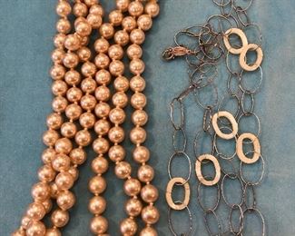 Item 231:  Vintage Pearls: $20                                                                         Item 232:  Mother of Pearl and Silvertone Link Necklace: $14