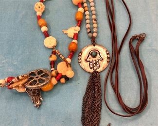 Item 236:  A Place to Begin Necklace: $22                                                     Item 237:  Hamsa Necklace: $16