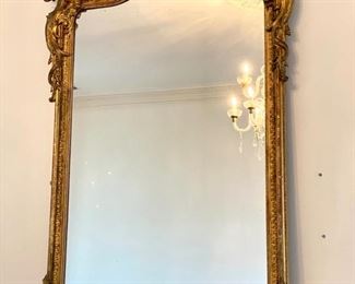Continental 19th c. Rococo giltwood overmantel mirror