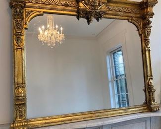 Renaissance Revival horizontal giltwood overmantel mirror