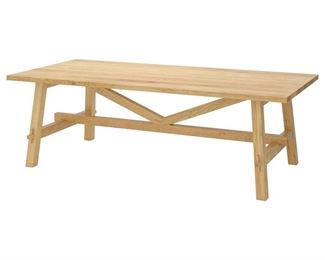 Sample stock image of the MÖCKELBY oak dining table by IKEA