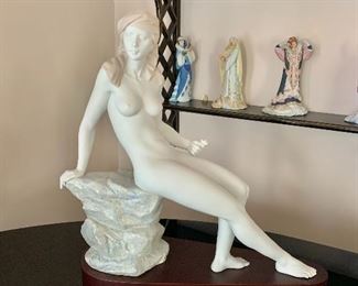 $450  Lladro  "Delphica" with wood base female figure #2: 20"L; 20"W: 6"D