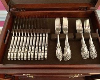 $3,500 - Towle sterling King Richard flatware set.  12 each knives, dinner forks, salad forks, soup spoons, tea spoons.  4 demitasse spoons, 4 serving spoons