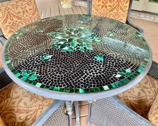 $650 - Mosaic "leaf" concrete table: 30"H; 47"Diam