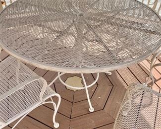Woodard Wrought Iron Mesh 48'' Wide Round Dining Table with Umbrella Hole - 29"H; 47"Diam