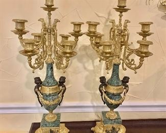 $550 - Pair ornate, ormolu, marble candle holders with cupid motif - Each: 27"H; 10"W: 10"D