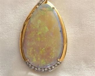 Opal pendant:  2"L; 2"W
