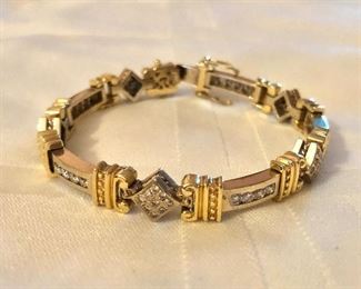 $895  14K gold and diamond bracelet 7"L