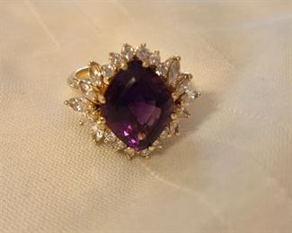 $350 14K gold  purple stone ring.  Size: 9