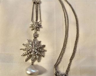 $2950   Marked Tiffany & Co.  Diamond with Pearl drop platinum necklace: 20"L