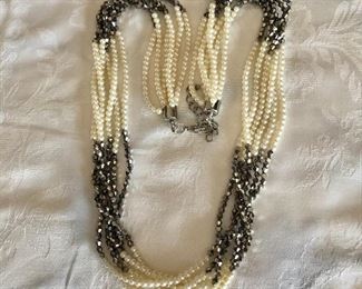 $20 Multi strand pearl and crystal necklace.  25"L