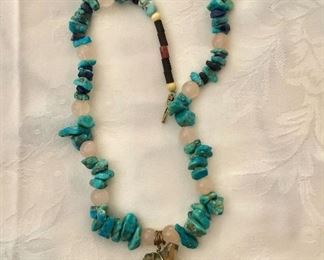 $50  Turquoise necklace with quartz and stone pendant.   21"L