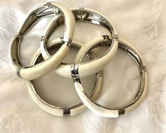 $22 All White and silver tone bangle bracelets.  2.5"Diam