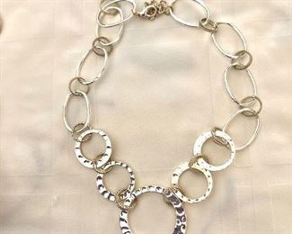 $20 Silver tone graduated hoop necklace.  20"L 
