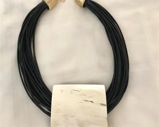 $18 Multi strand necklace with square chunky center.  Necklace: 25"L,  Pendant: 3"x3"