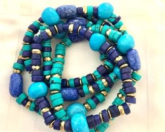 $22 5 colorful bracelets can be worn as one or separately.  Each: 2.5"Diam elastic 