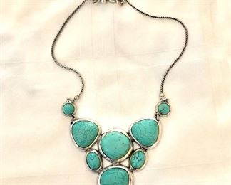 $25 Spider web type faux turquoise silver tone necklace.  20"L